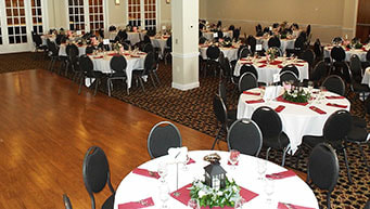 People Sitting at Tables for a Corporate Event