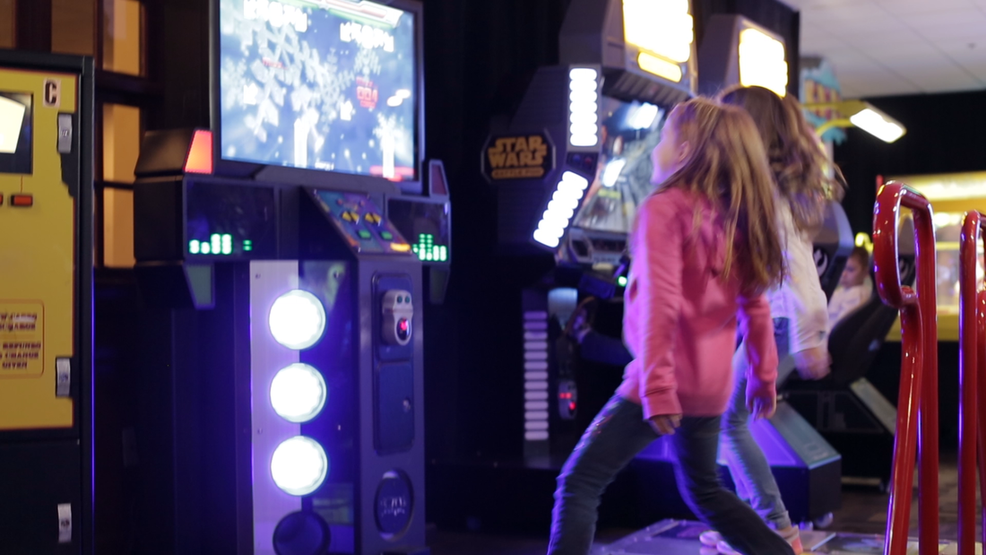 Group of Kids Playing at Arcade